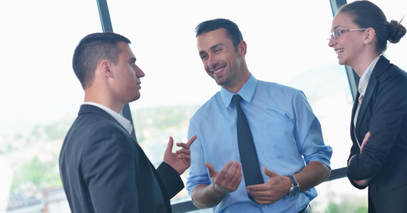 team members chatting at work