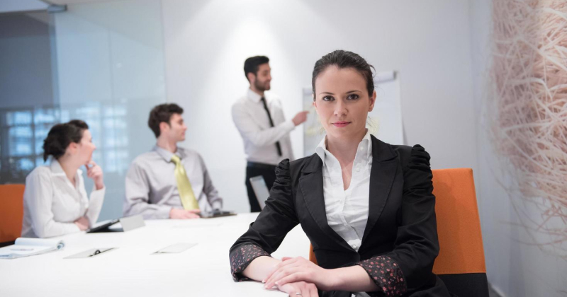 a leader at a work meeting