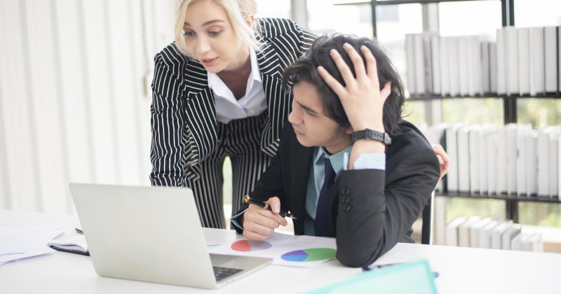 an employer guiding employee