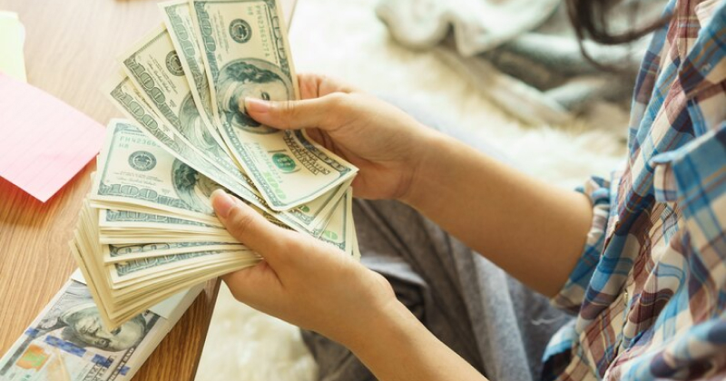a person counting money