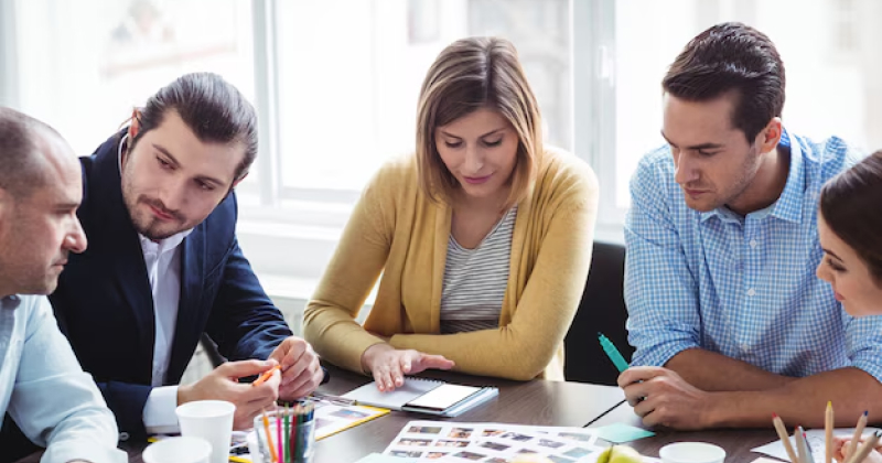 group of team members having meeting