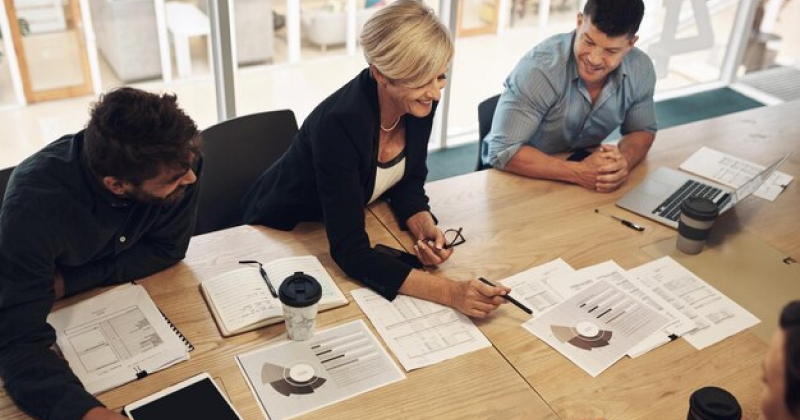 team members analysing work decisions