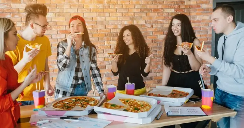 employees having Pizza Day at work