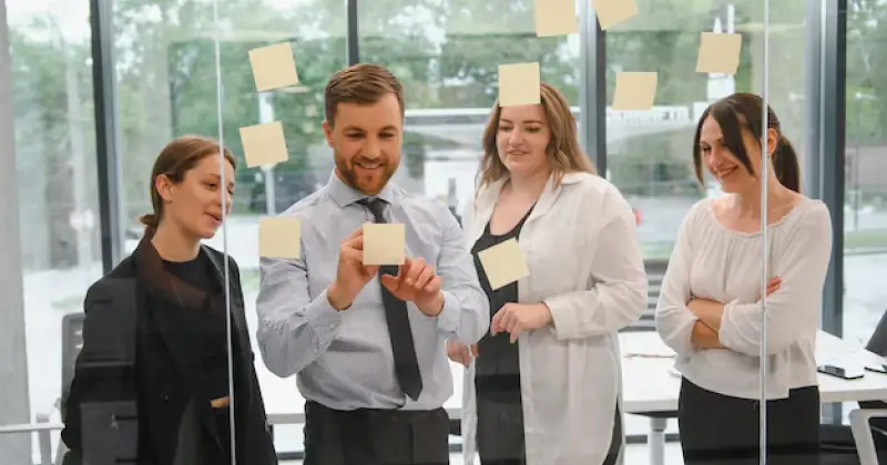 team members having discussion at work