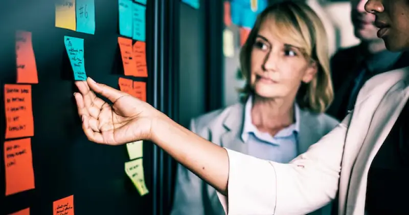 two colleagues making a work decision
