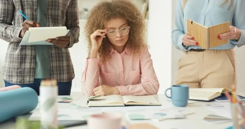 student focusing on homework