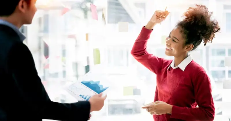 an employee and employer talking