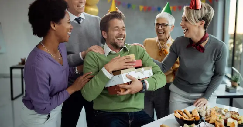 co workers having a celebration at work