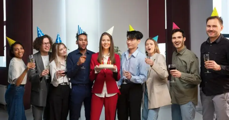 some co-workers having a birthday party at work