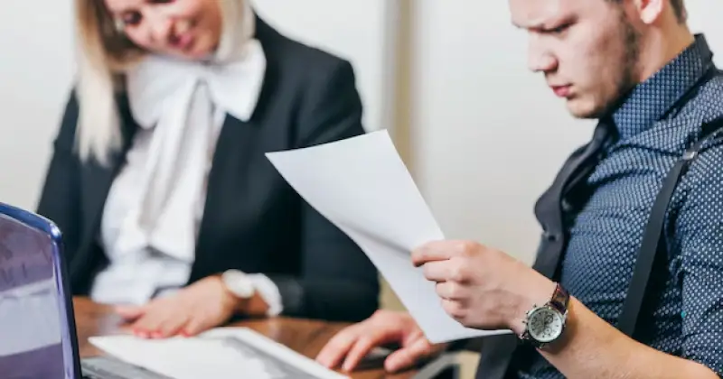 an employee checking legal documents