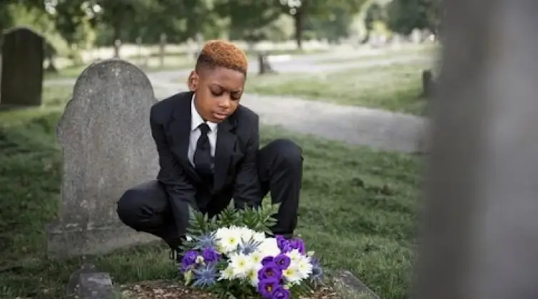 a child in a cemetery