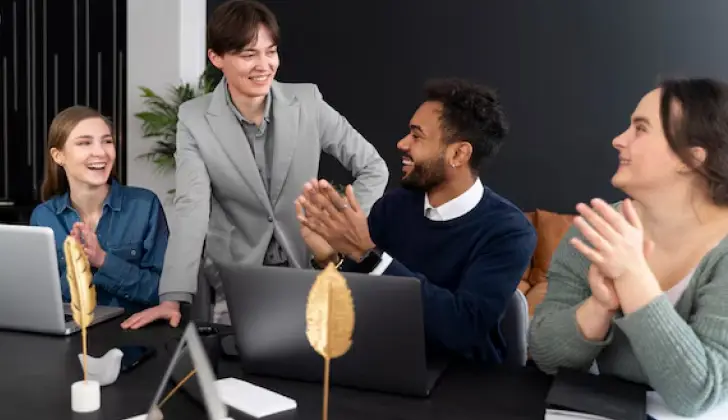 co workers celebrating organizational innovation