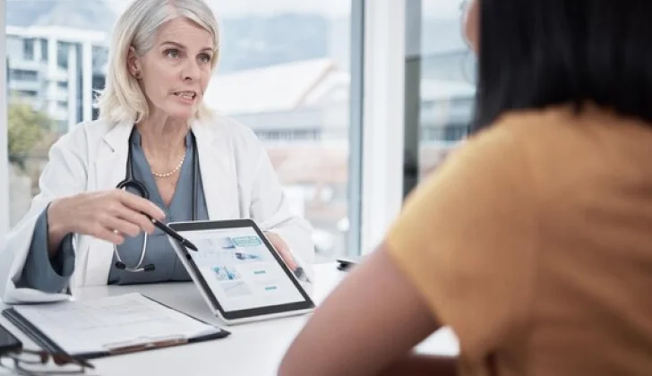 a doctor explaining details to a patient