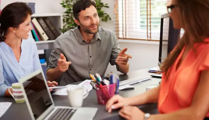 employees talking to the employer