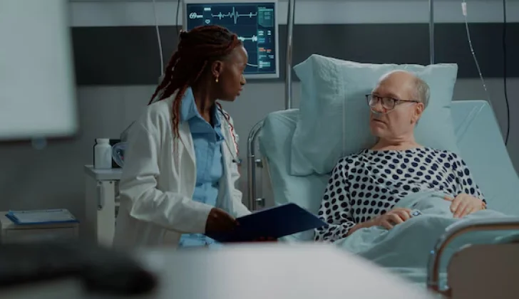 a doctor visiting her patient in hospital