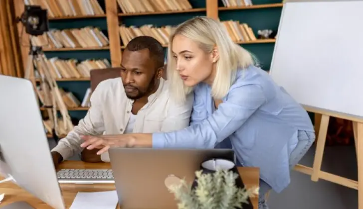 two employees learning new details