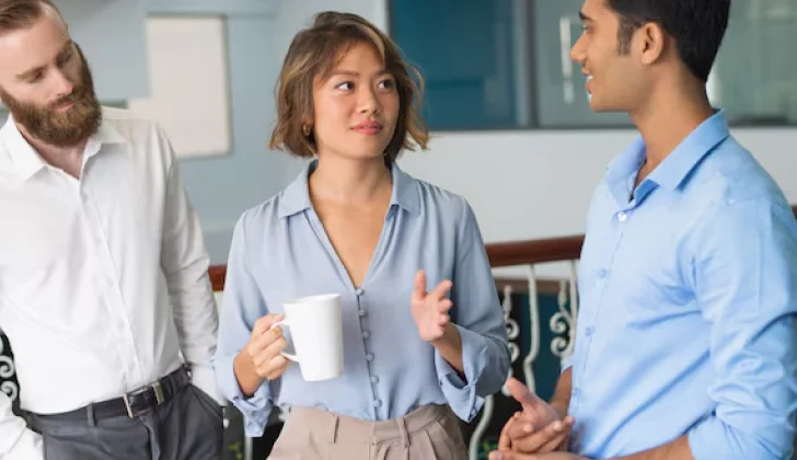 co-workers discussing about career goals