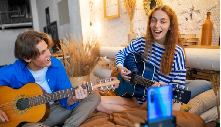 Two Generation Z singers recording video