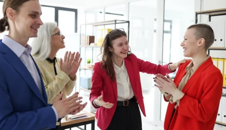 team members celebration an employee success