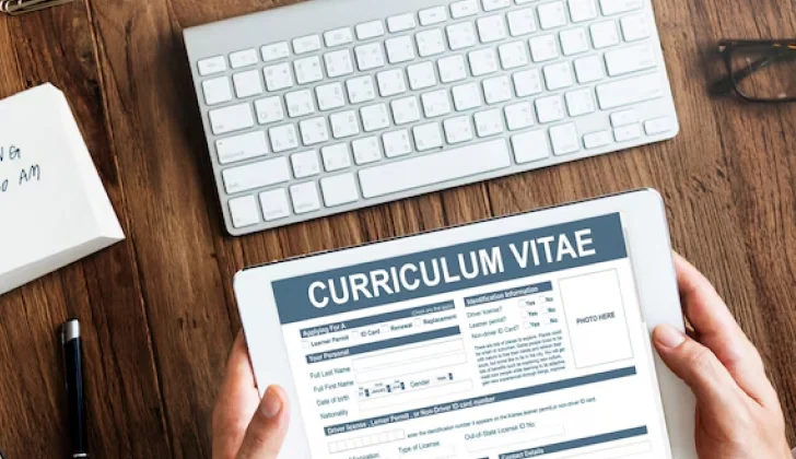 an employer checking a resume