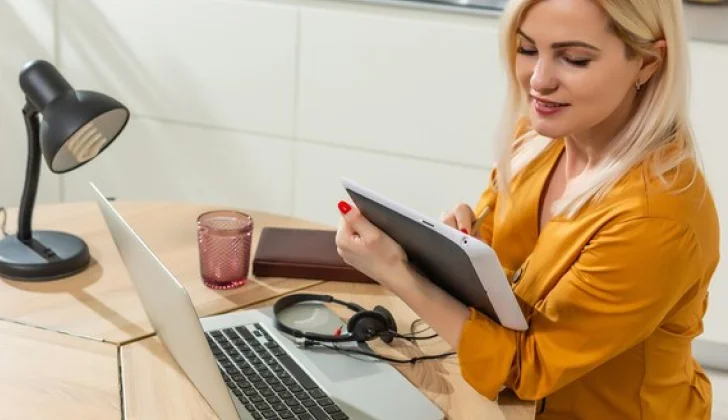 a girl working on her tablet