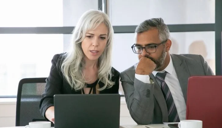 two employees working on a project