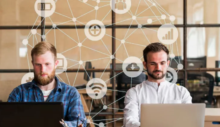 two employees working together