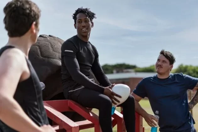 team members having a physical activity together