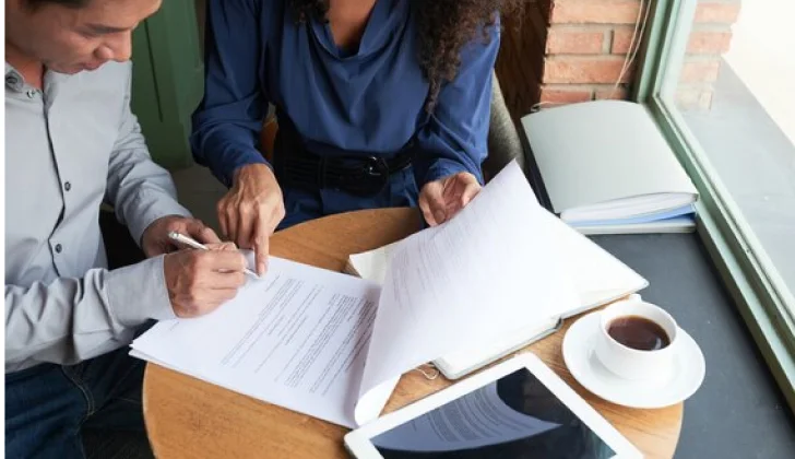 an employee filling contracts