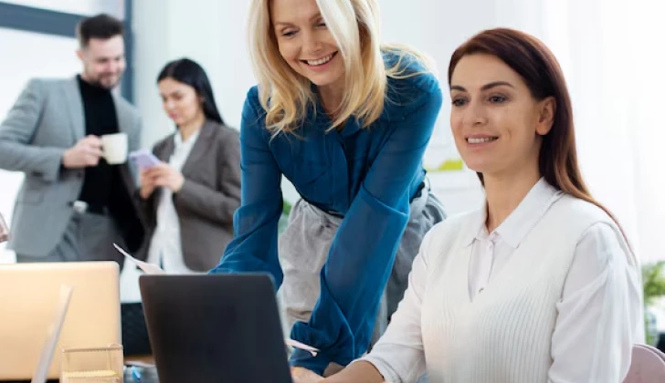 two employees working on a project