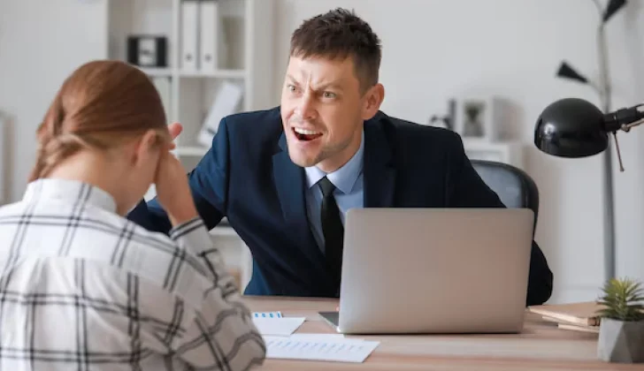 an employer yelling at an employee