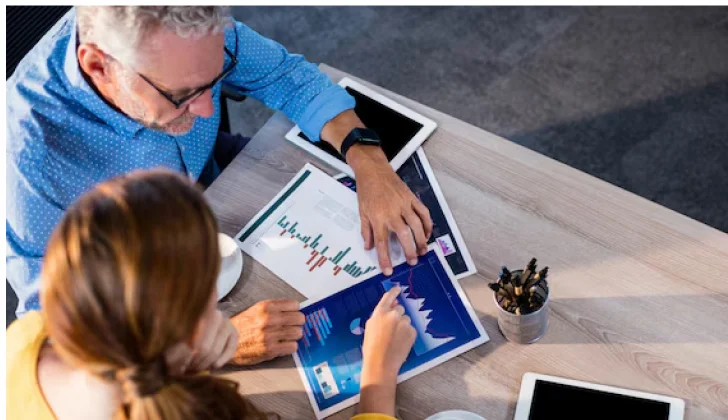 two employees working on a project