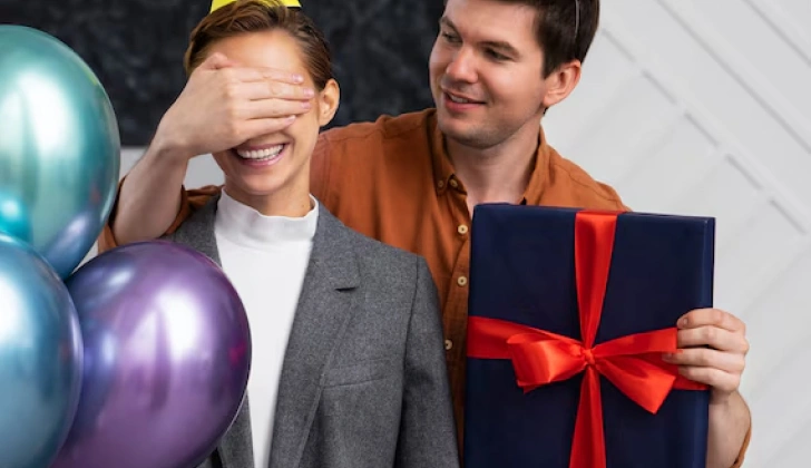 an employee surprising another employee