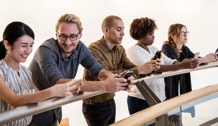 some employees checking their phones