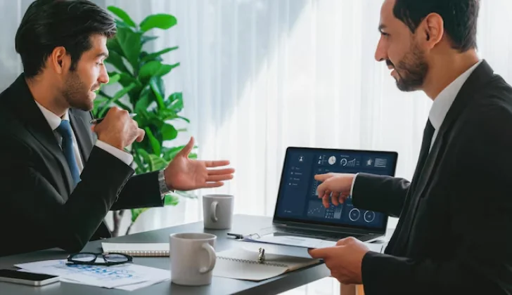 an employee explaining a project to a manager