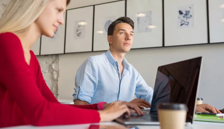 employees in the office working