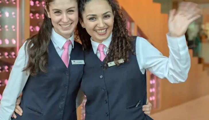 two Hilton employees