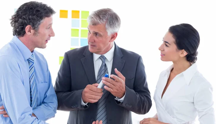 a manager talking to his employees
