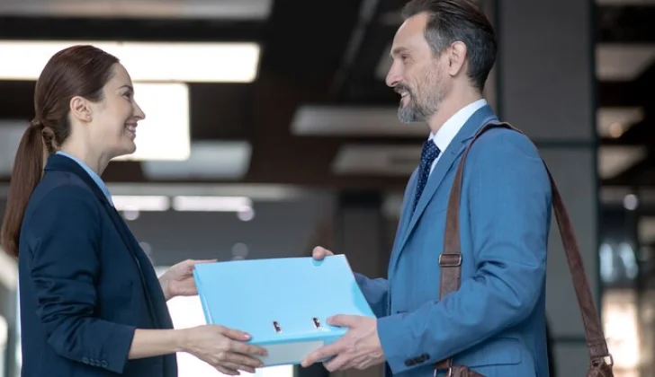 two employees having a conversation