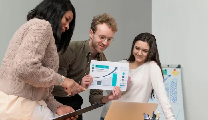 employees working on data chart