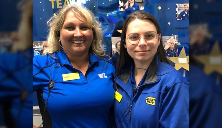 two happy best buy employees