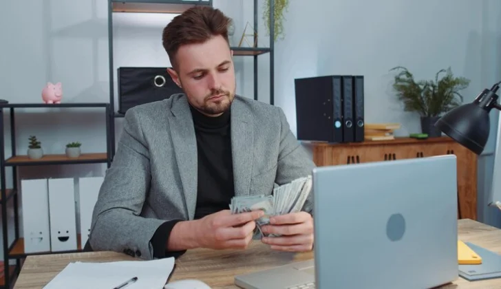 an employer counting cash