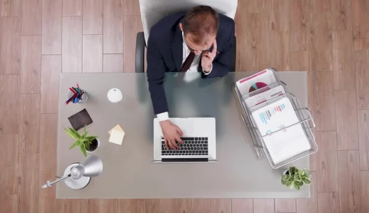 an employer working on some tasks