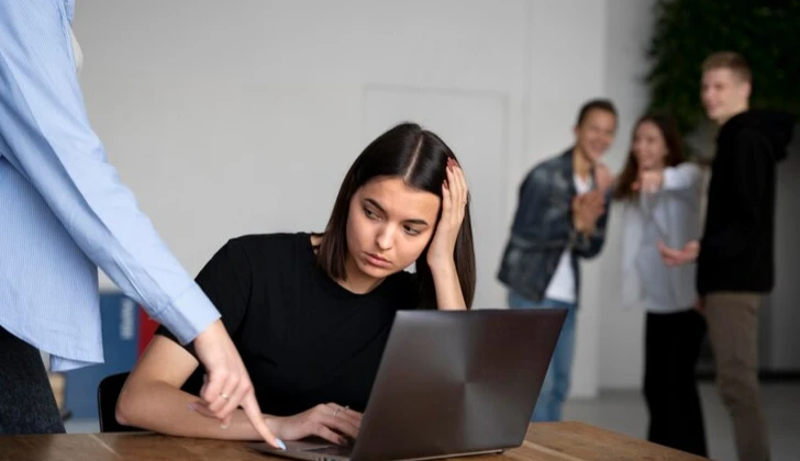 a sad employee at work