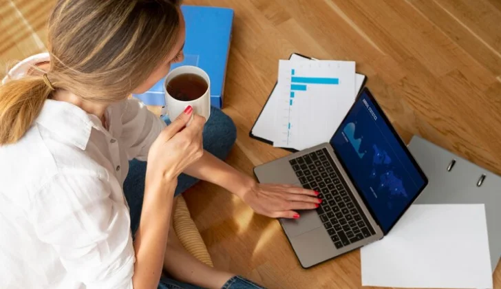 a women checking ROI documents