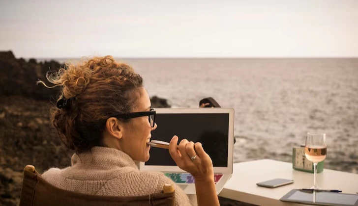 a person working next to sea