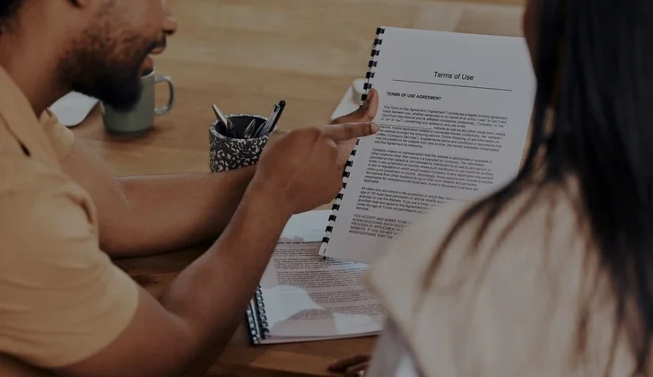 two people reading a contract