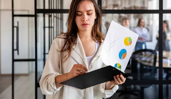 an employee checking charts