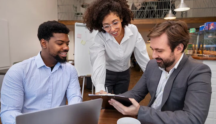 some employees analyzing a task