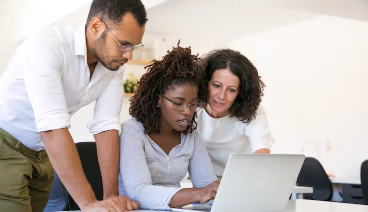 some employees working on a. task